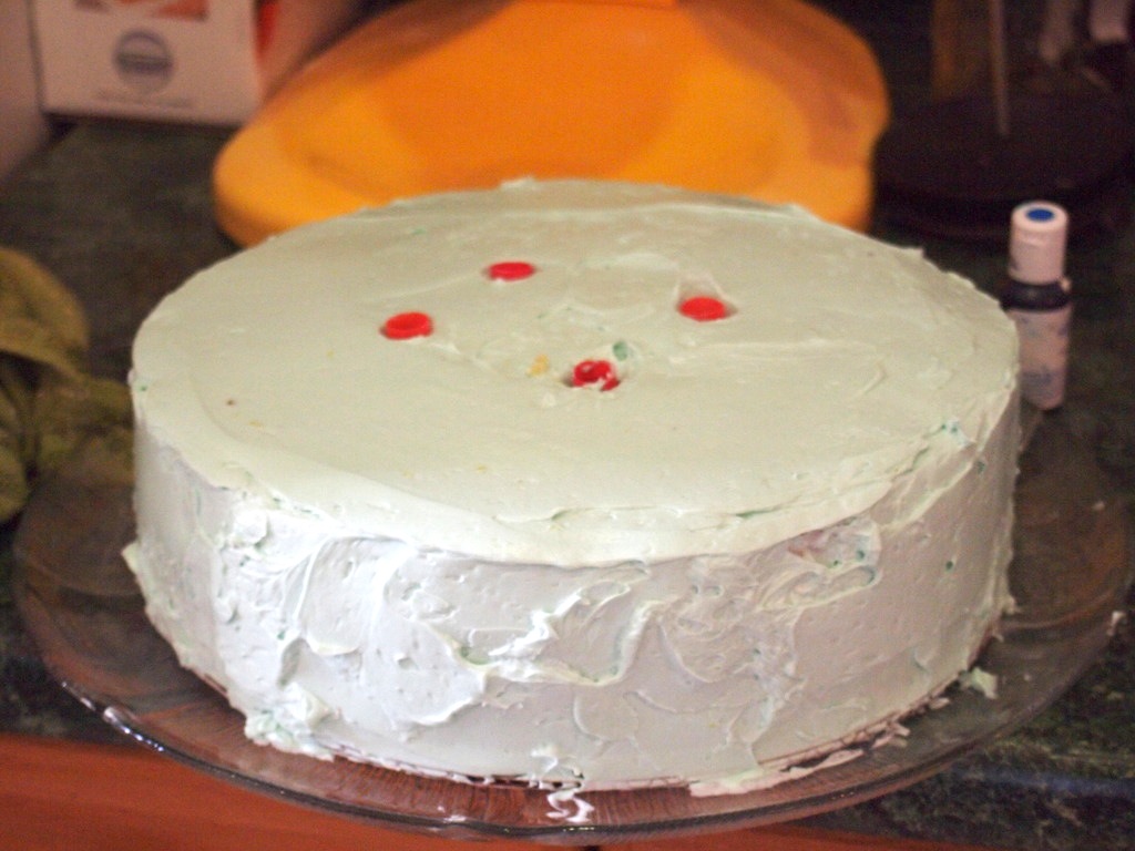 Here is Tier 1, studded with bubble tea straws and ready for Tier 2 to be dropped on top (carefully, using a 12-inch cake spatula).